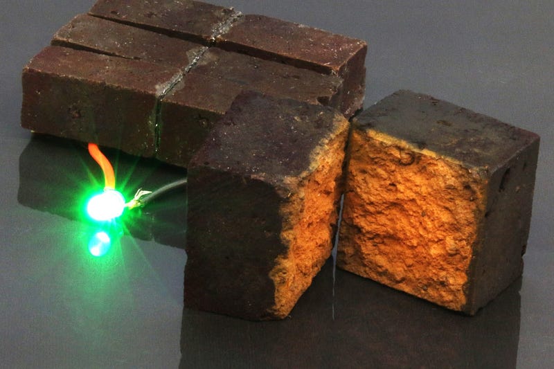 PEDOT-coated brick powering a green LED