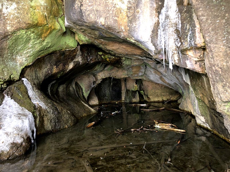 The stunning geological formations within the cave.