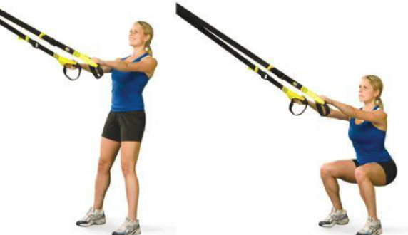 Demonstration of TRX squat exercise